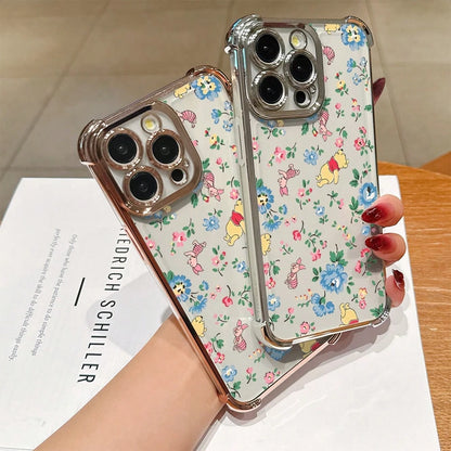 Disney.What Floral Patterned Phone Case With Winnie The Pooh Showing Friendship And Joy. Compatible With IPhone 17, 16, 15, 14, 13, 12, And 11 Pro Models. Made Of TPU With Shockproof Protection. A De
