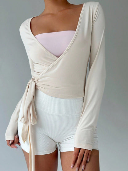 FavEase Women's Light Beige Yoga Sports Wrap Cardigan,Soft & Stretchy V-Neck Long Sleeve Cropped Fitted Tee,Summer Casual Workout Fashionable Minimalist Top