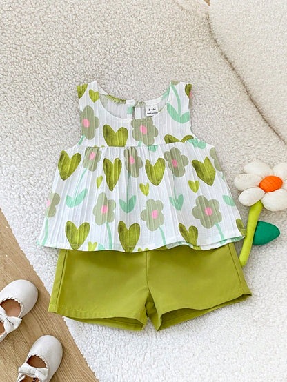Playful Pals Babygirl A Two Pieces Summer Round-Neck Sleeveless Top And Red Shorts Set. Fresh Red And White Color Contrast, Woven Fabric, Loose Fit. The Style Is Sweet, Elegant And Pastoral, Wit