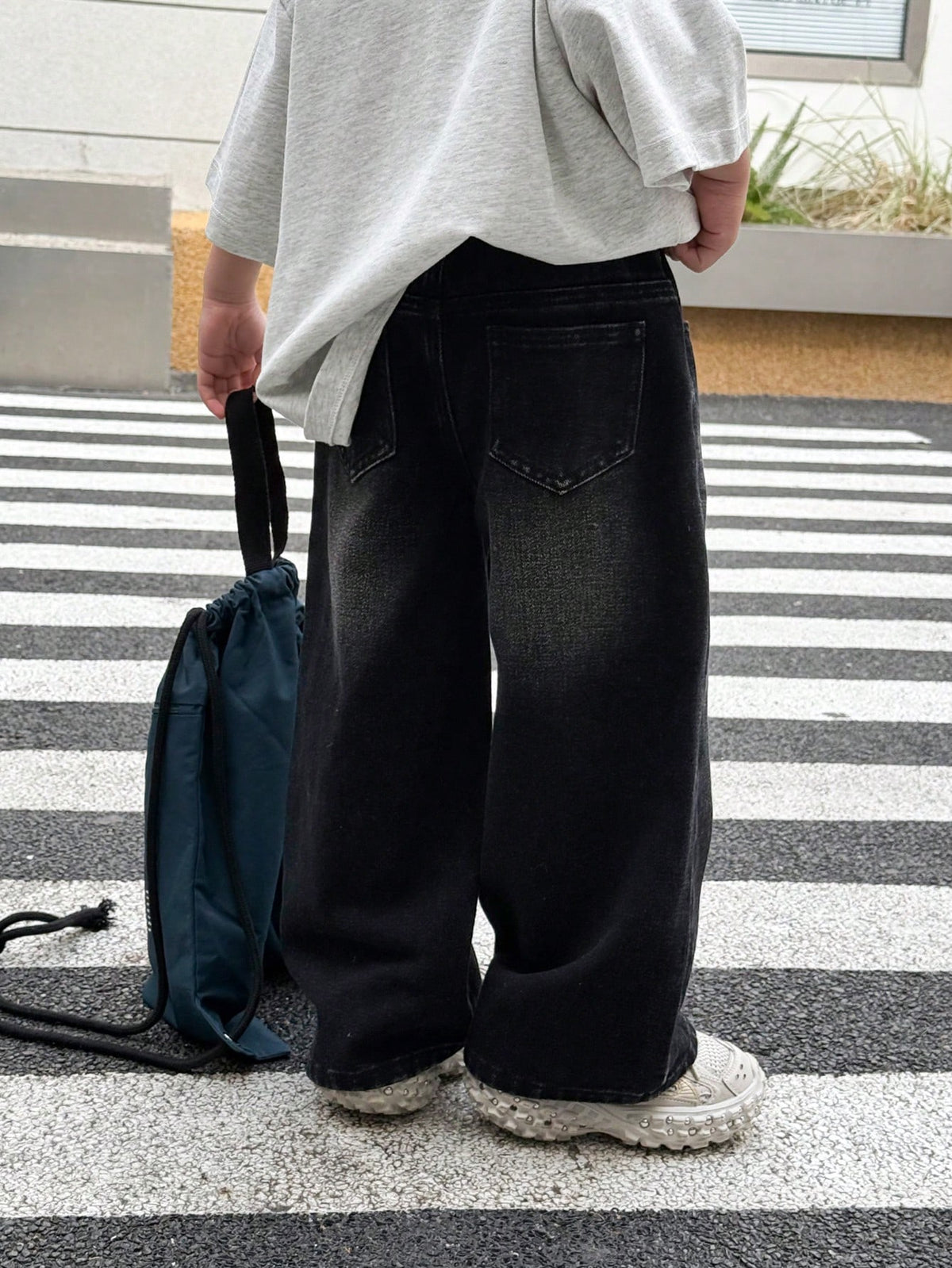 Young Boy Fashionable Distressed Washed Cat Whiskers Baggy Loose Fit Black Denim Jeans, For Kids Daily Wear And Streetwear